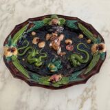 Plat en barbotine décor de coquillages et de lézard Palissy