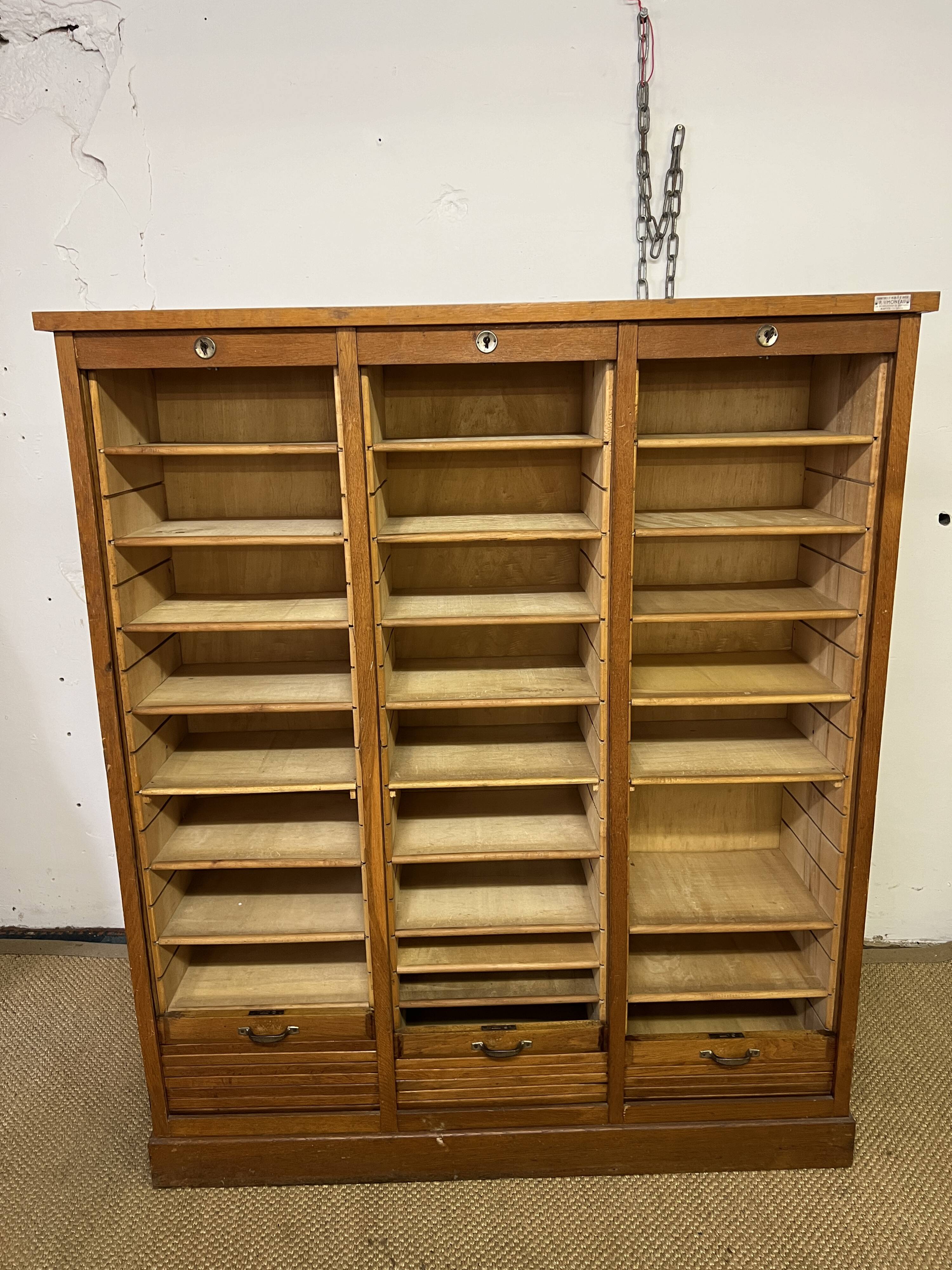 Old filing cabinet with triple curtains