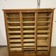 Old filing cabinet with triple curtains