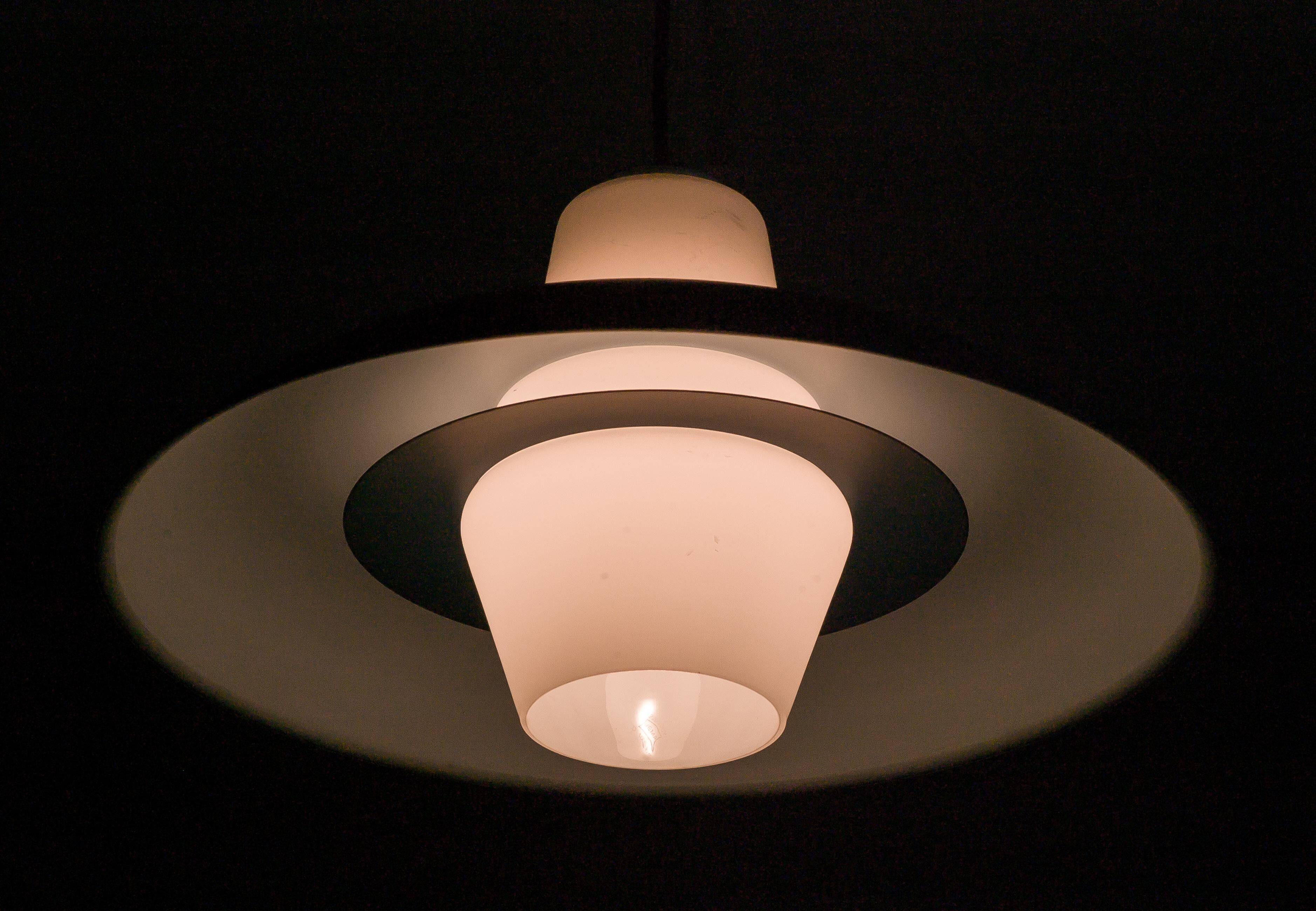 Philips pendant light in frosted sky blue glass by Louis Kalff