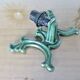 Series of 3 green enameled cast iron wall lights from the 30s and 40s
