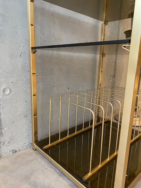 Golden brass and glass shelves