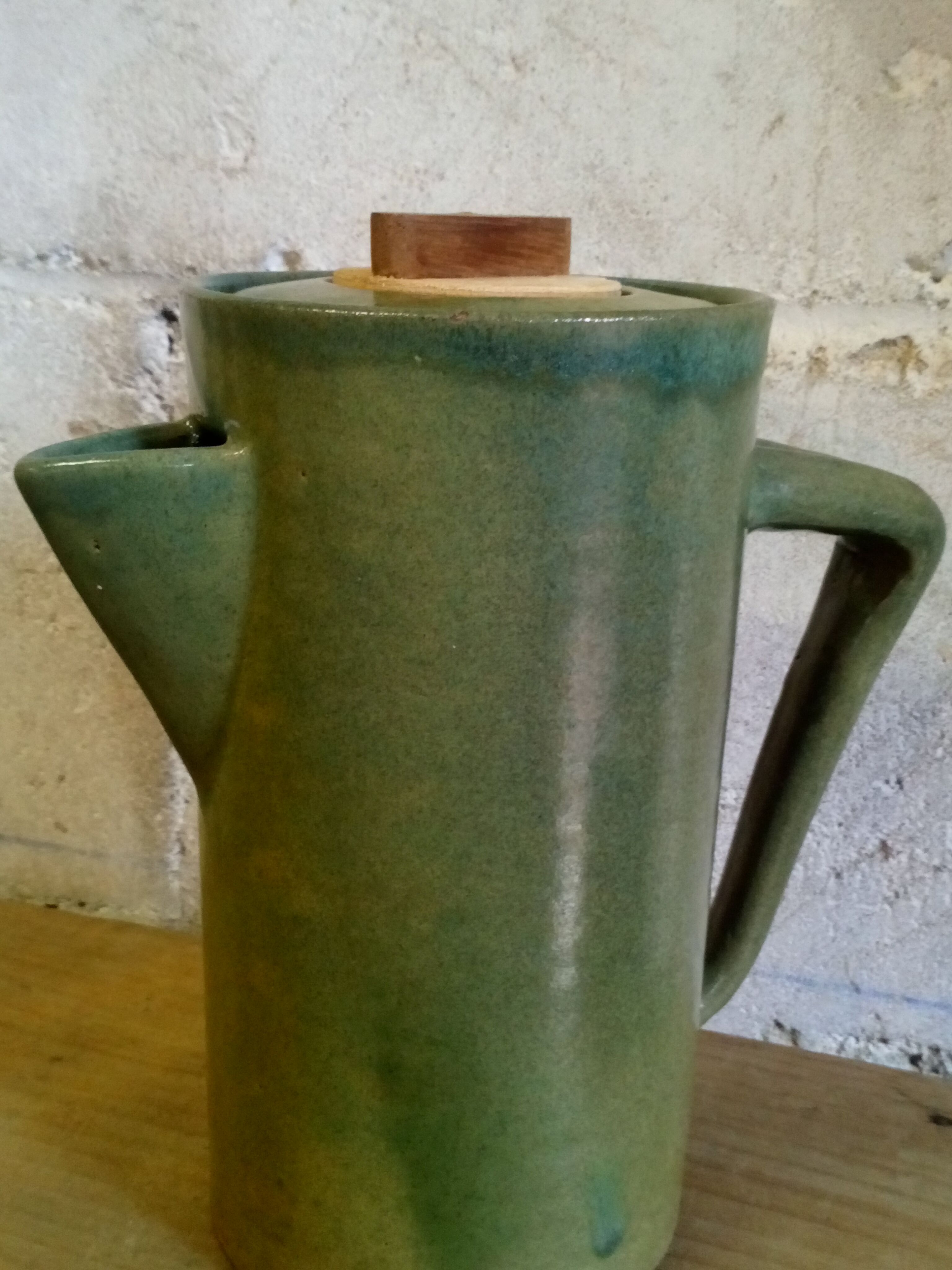 Green emailed sandstone teapot