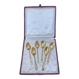 Set of golden metal spoons