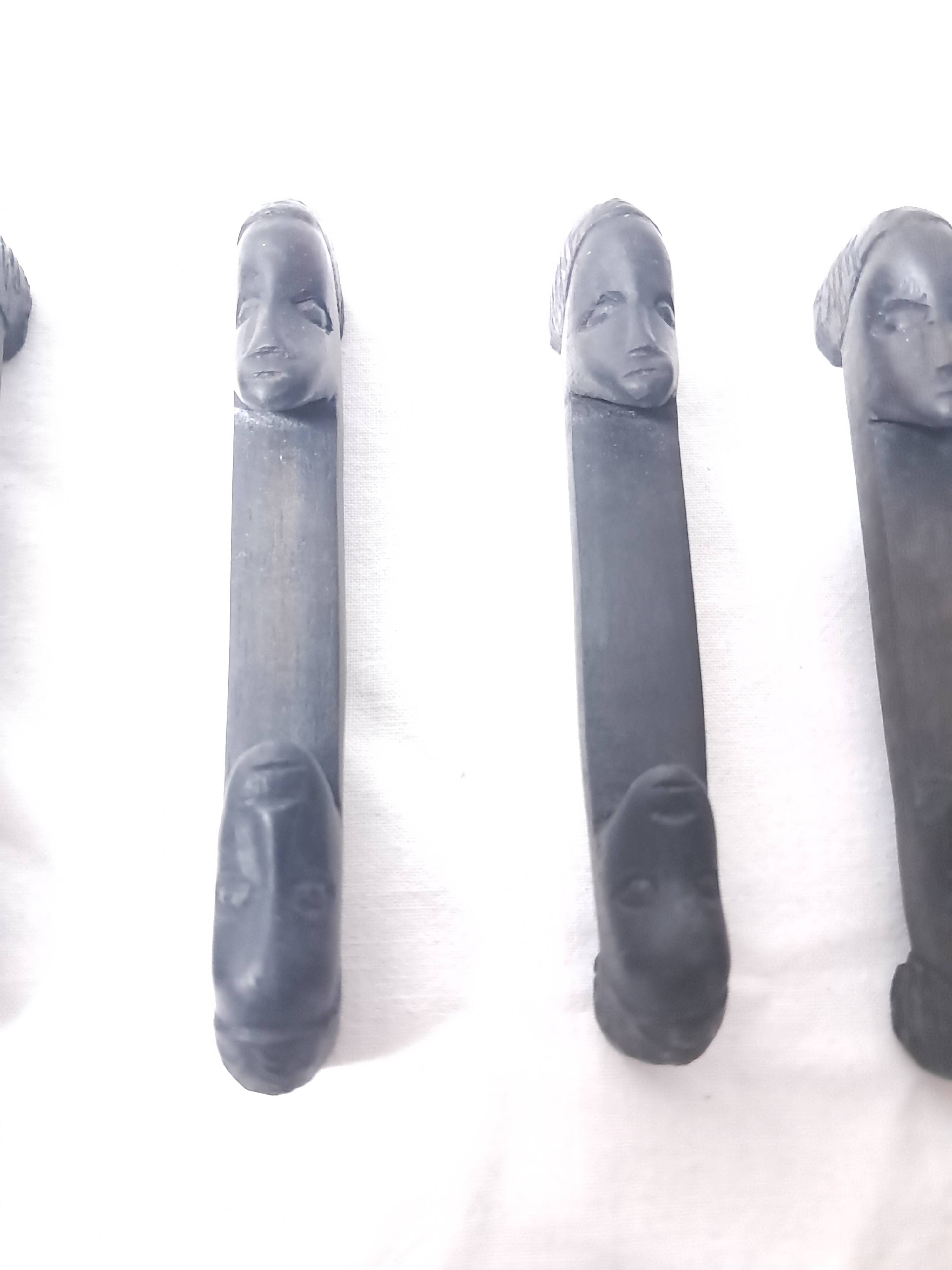 Set of six african cutlery holders carved in blackened wood