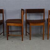 Round teak dinning table and chairs by Mctintosh