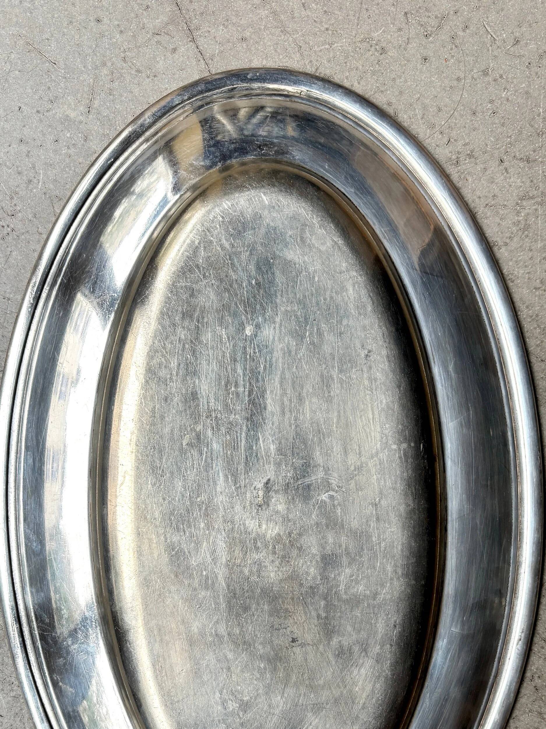 Oval silver-plated metal dish monogrammed "EM"