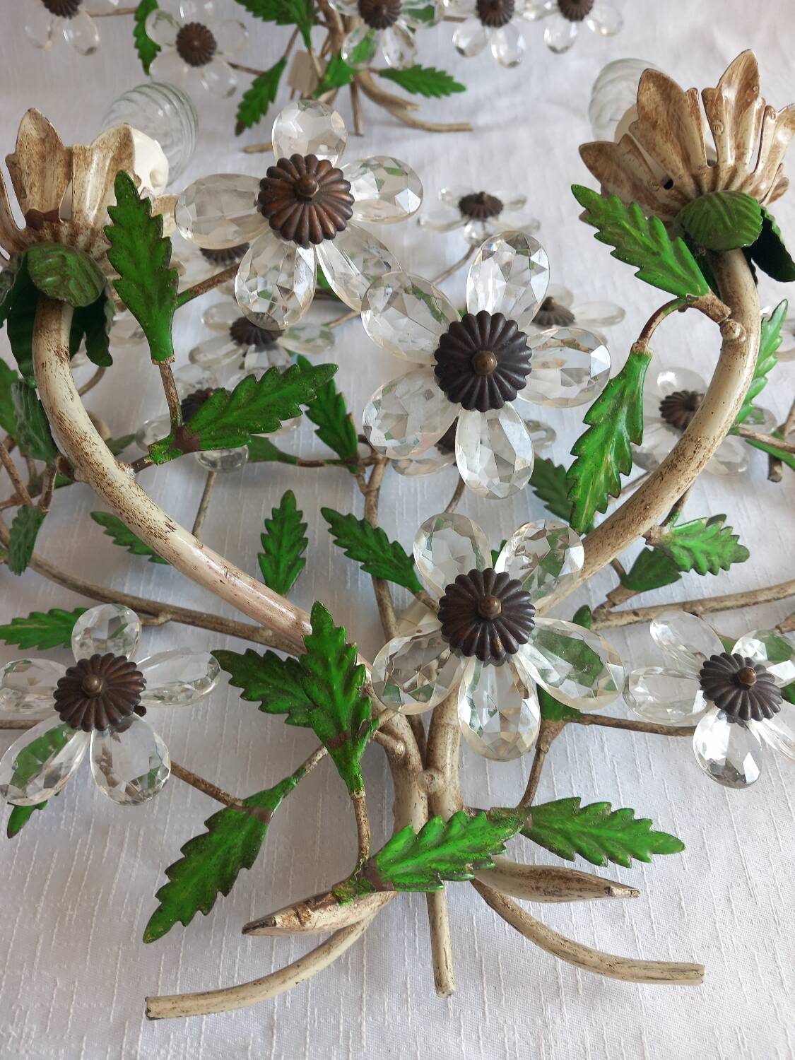 Pair of Italian Florentine wall sconces in tin and glass.