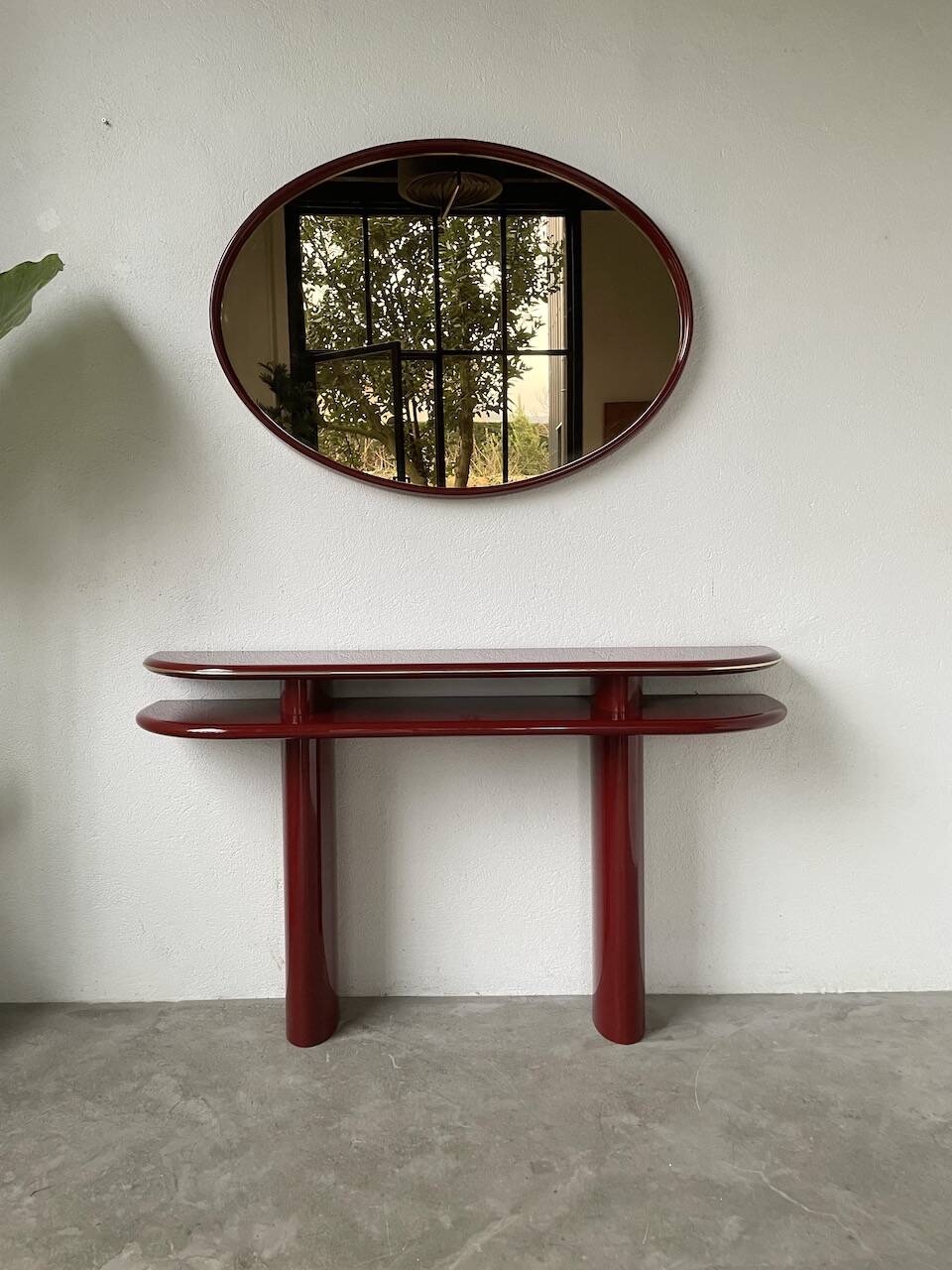 Red lacquered console and its mirror from the 80s
