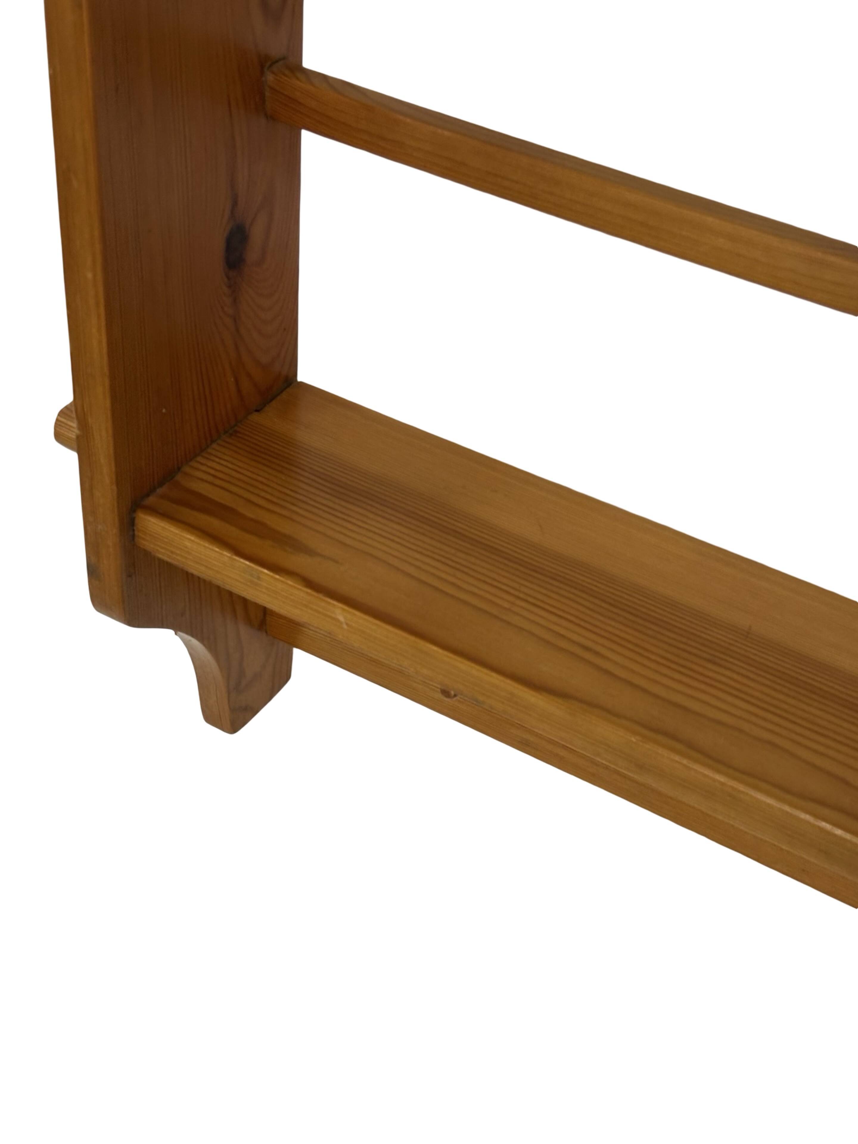 Vintage wooden wall shelve rack bookshelf in pinewood minimalist design