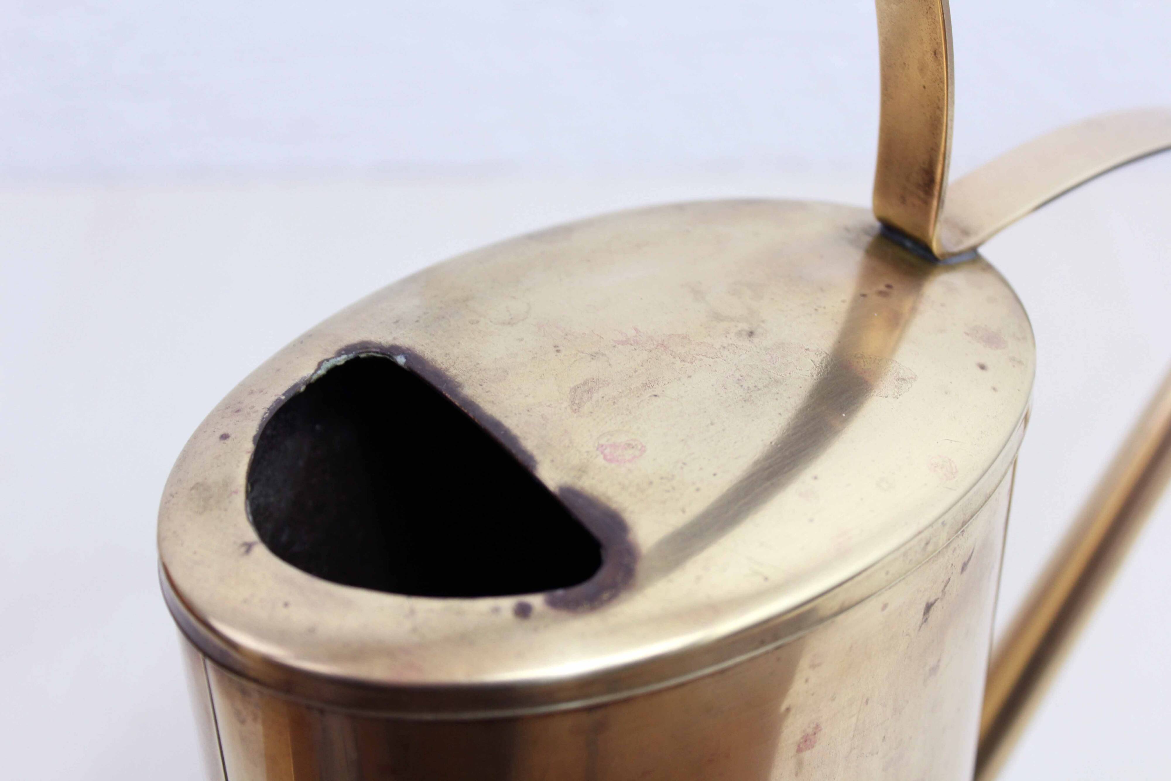 Vintage brass watering can