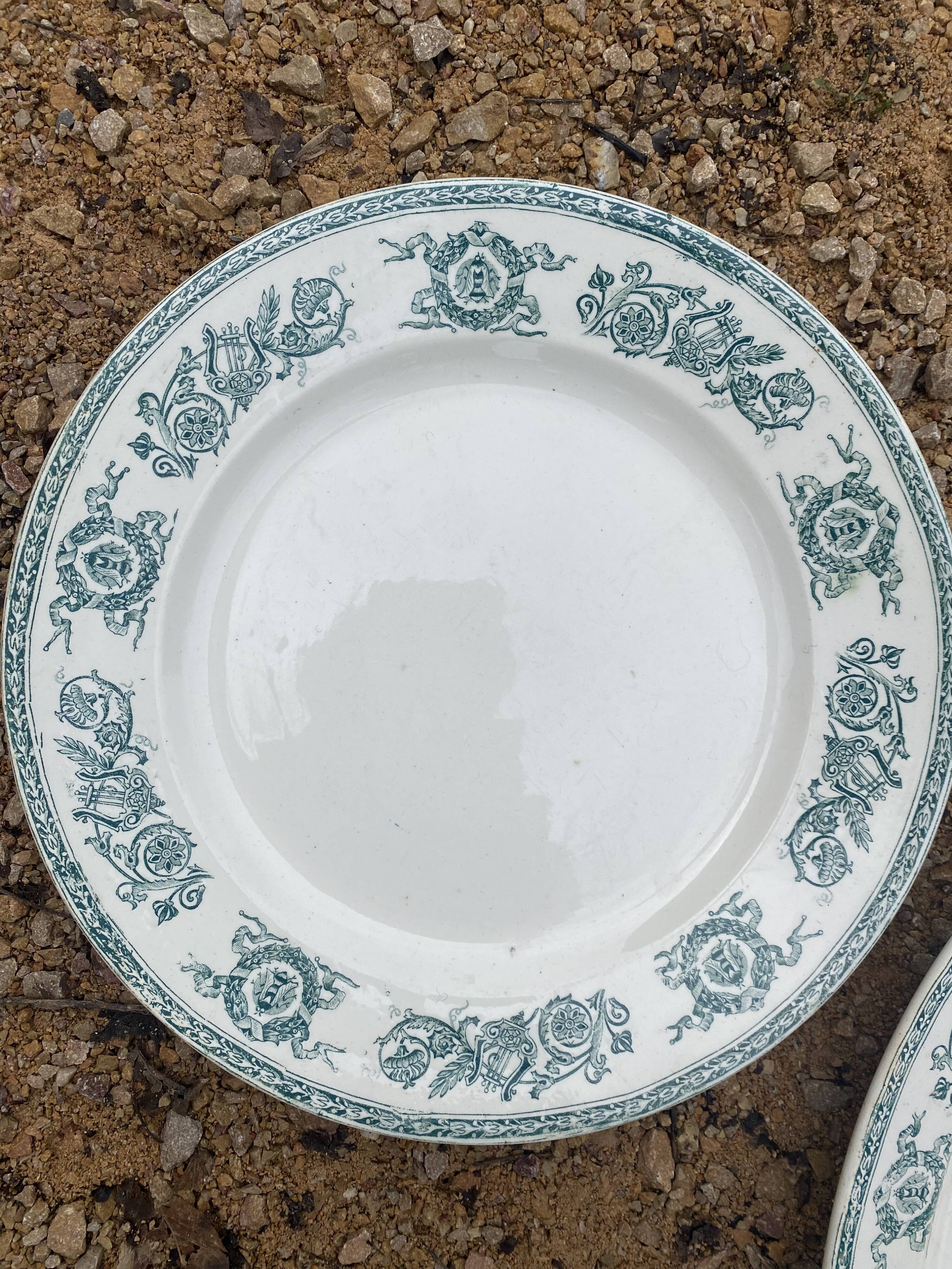 Duo of serving dishes in old green earthenware