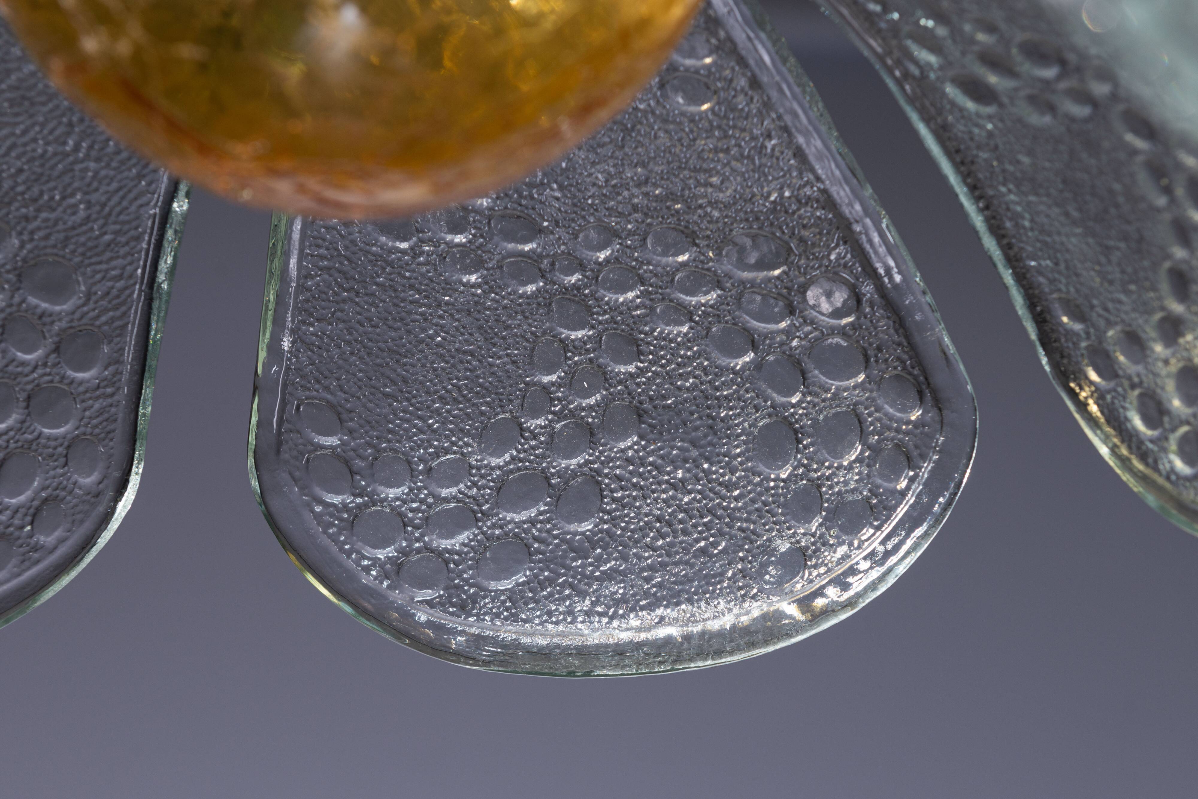 Swedish pendant with glass leaf shades and a center shade of amber coloured