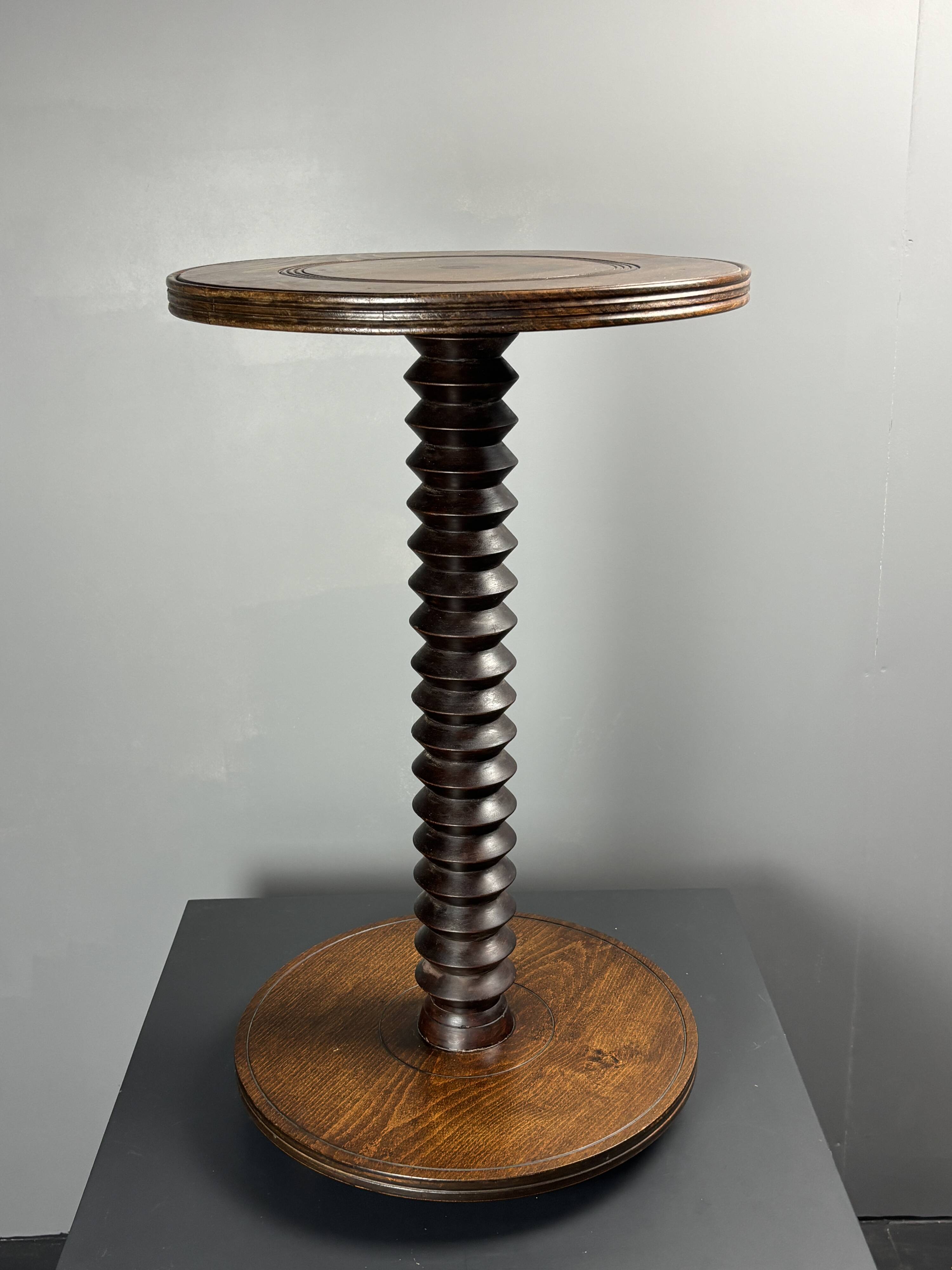 Midcentury brutalist wood turned side table in the style of Charles Dudouyt