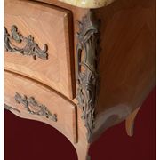 Curved commode