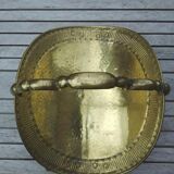 Old brass log holder