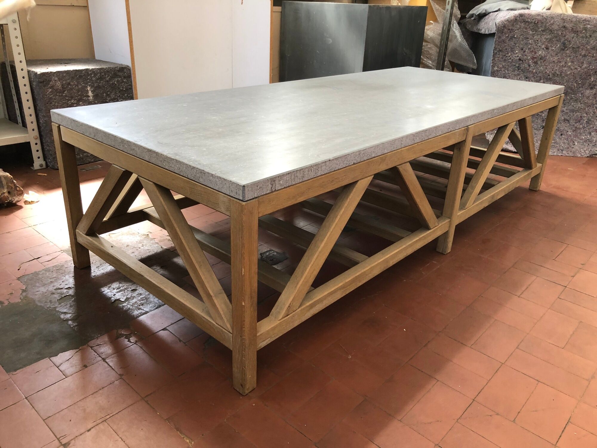Coffee table in natural oak and top in blue stone of Flamant