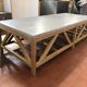Coffee table in natural oak and top in blue stone of Flamant
