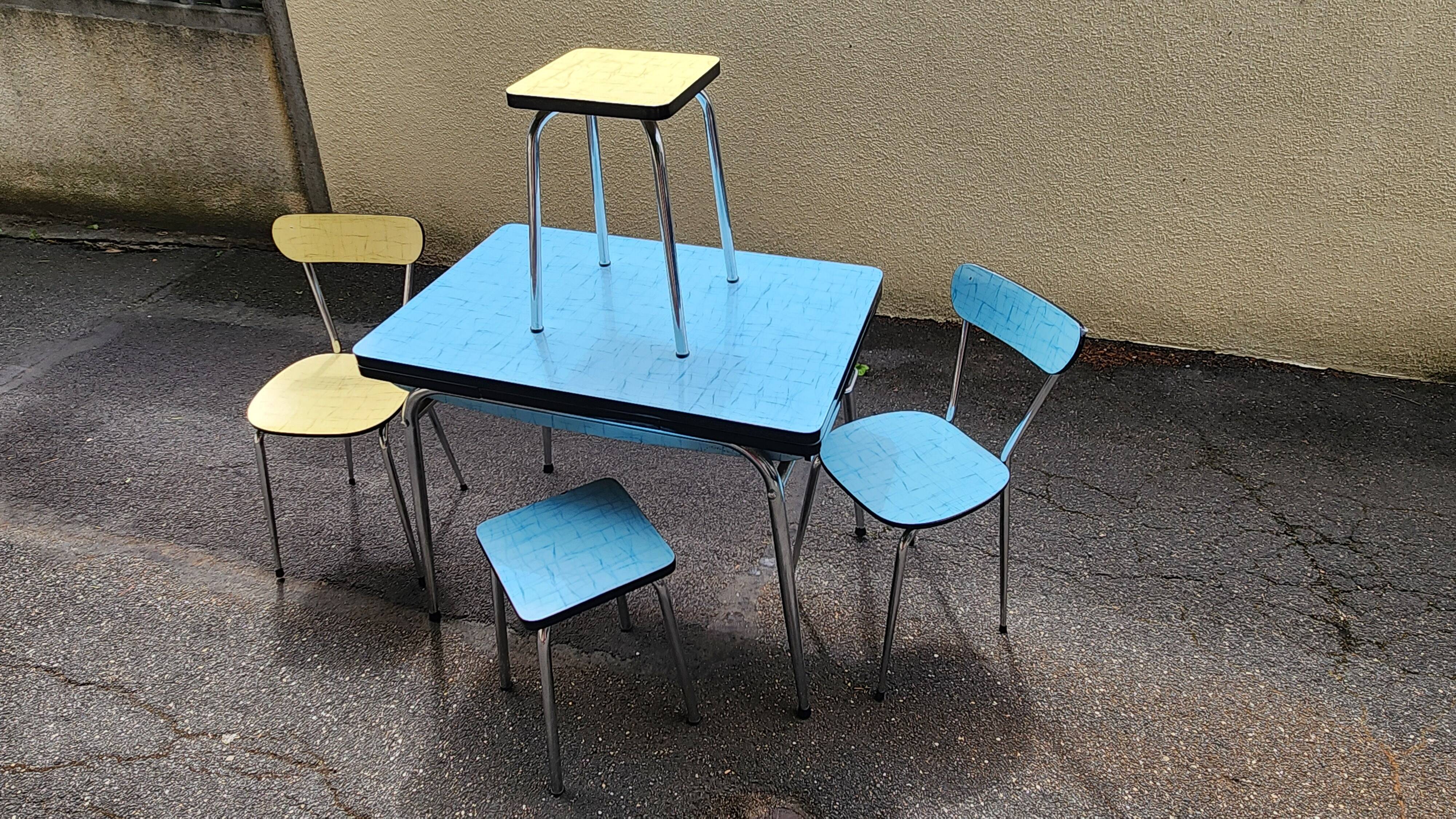 Vintage set from the 60s/70s: table, chairs, and marbled Formica stools.