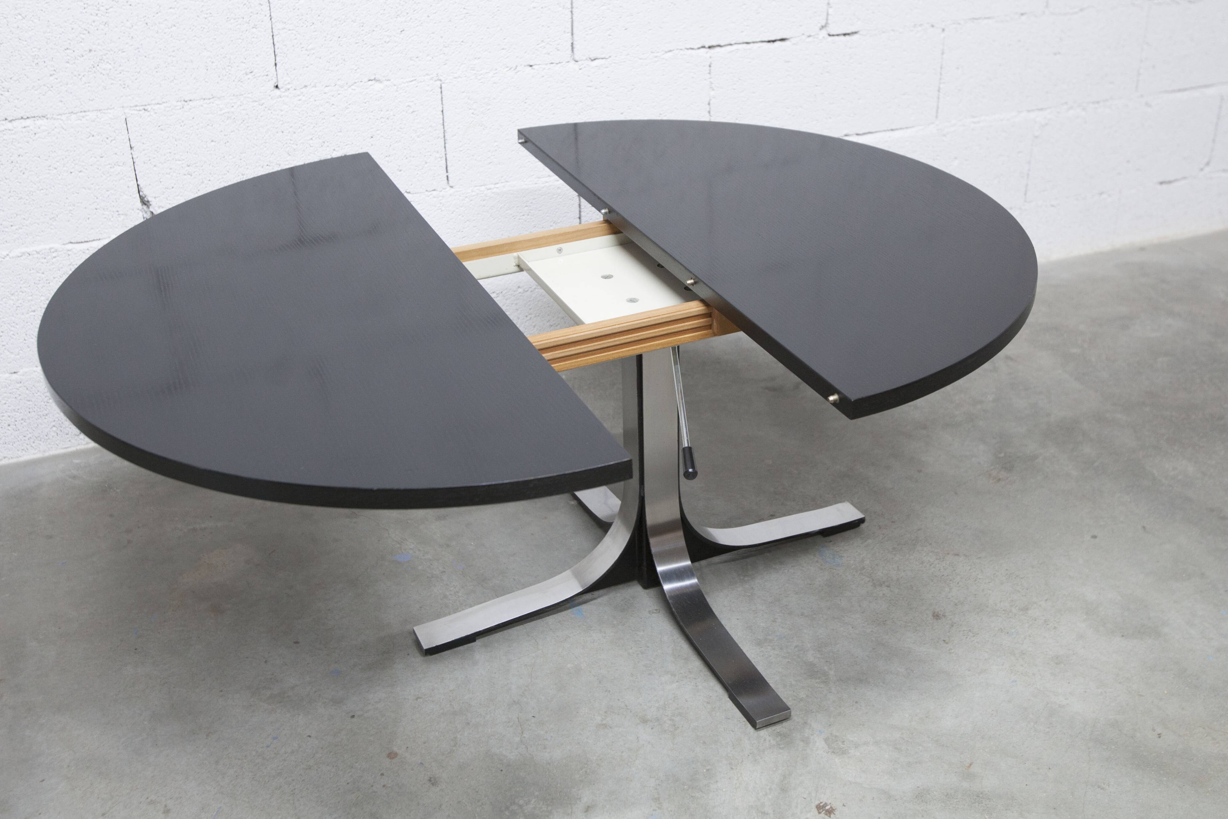 Round table rises and lowers Osvaldo Borsani black and chrome with extension