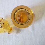 Zoomorphic carafe in amber glass