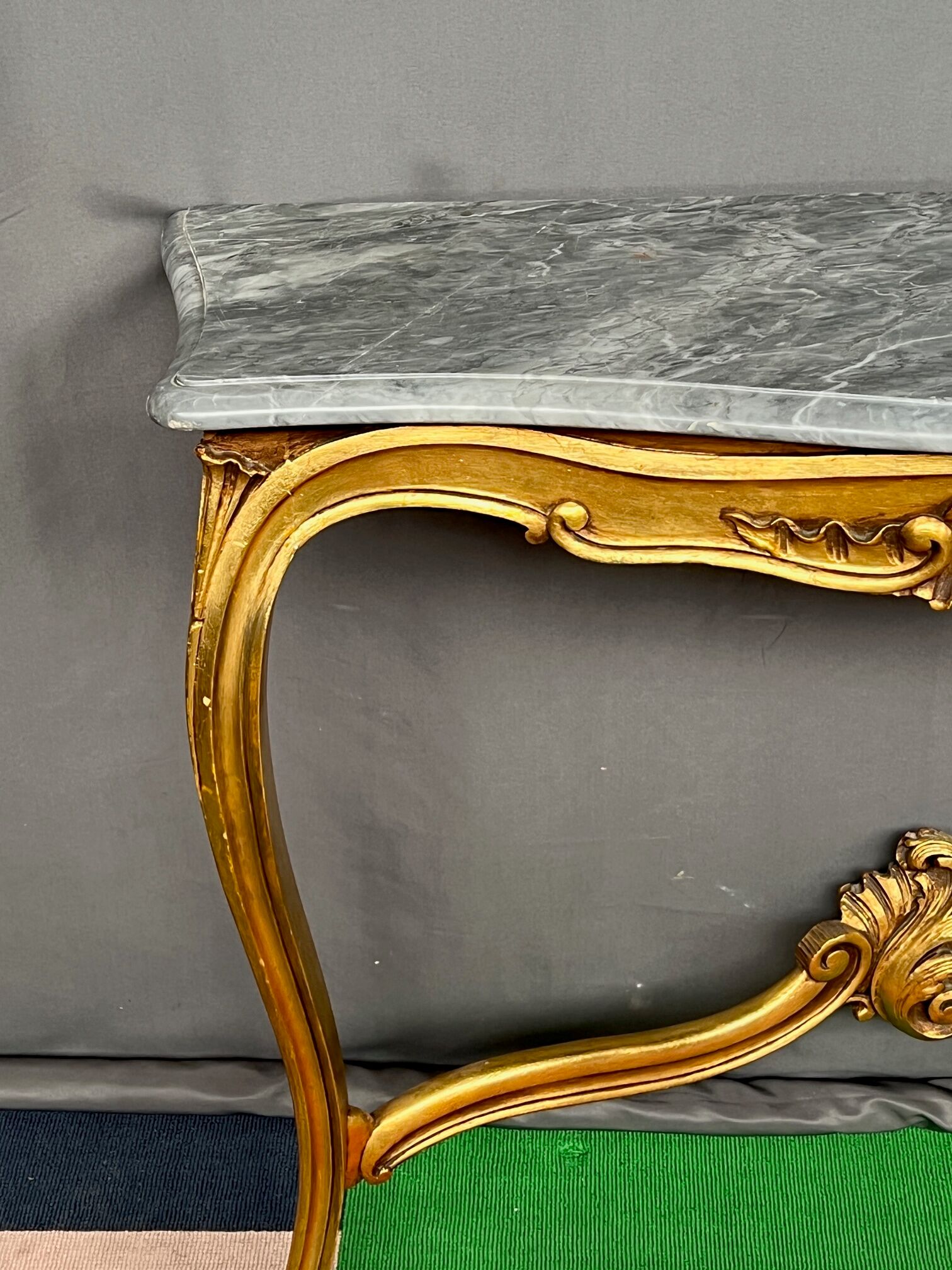 Baroque style console in carved wood with marble top