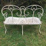 Banquette de jardin ancienne en fer forgé. Vers 1900