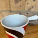 Vintage Le Creuset enameled cast iron fondue pot from the 1970s