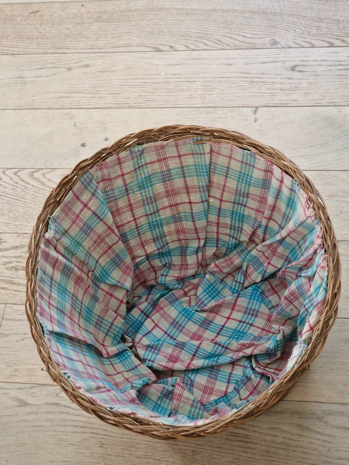 Vintage rattan basket lined with fabric