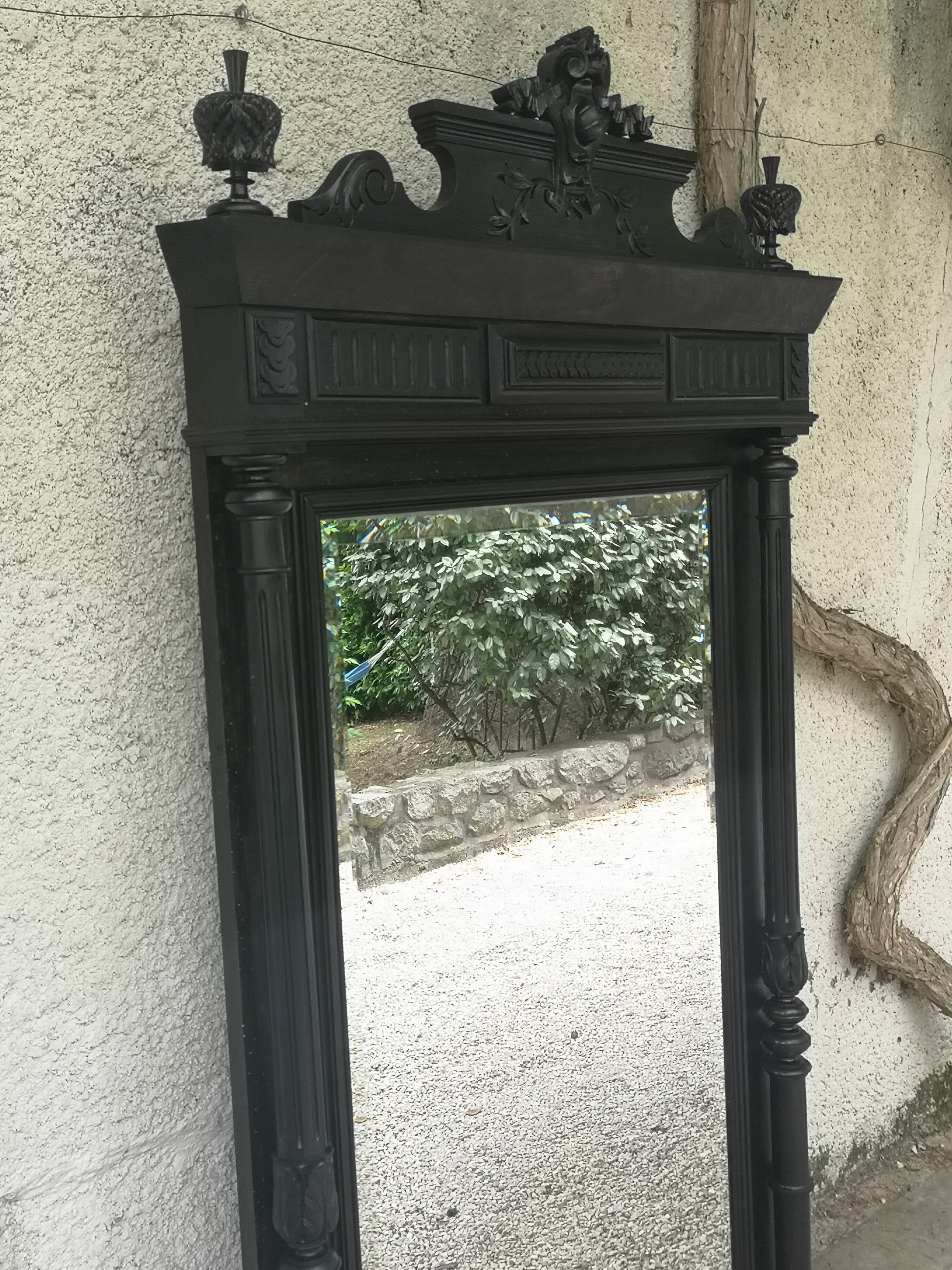 Trumeau mirror in blackened wood 19th
