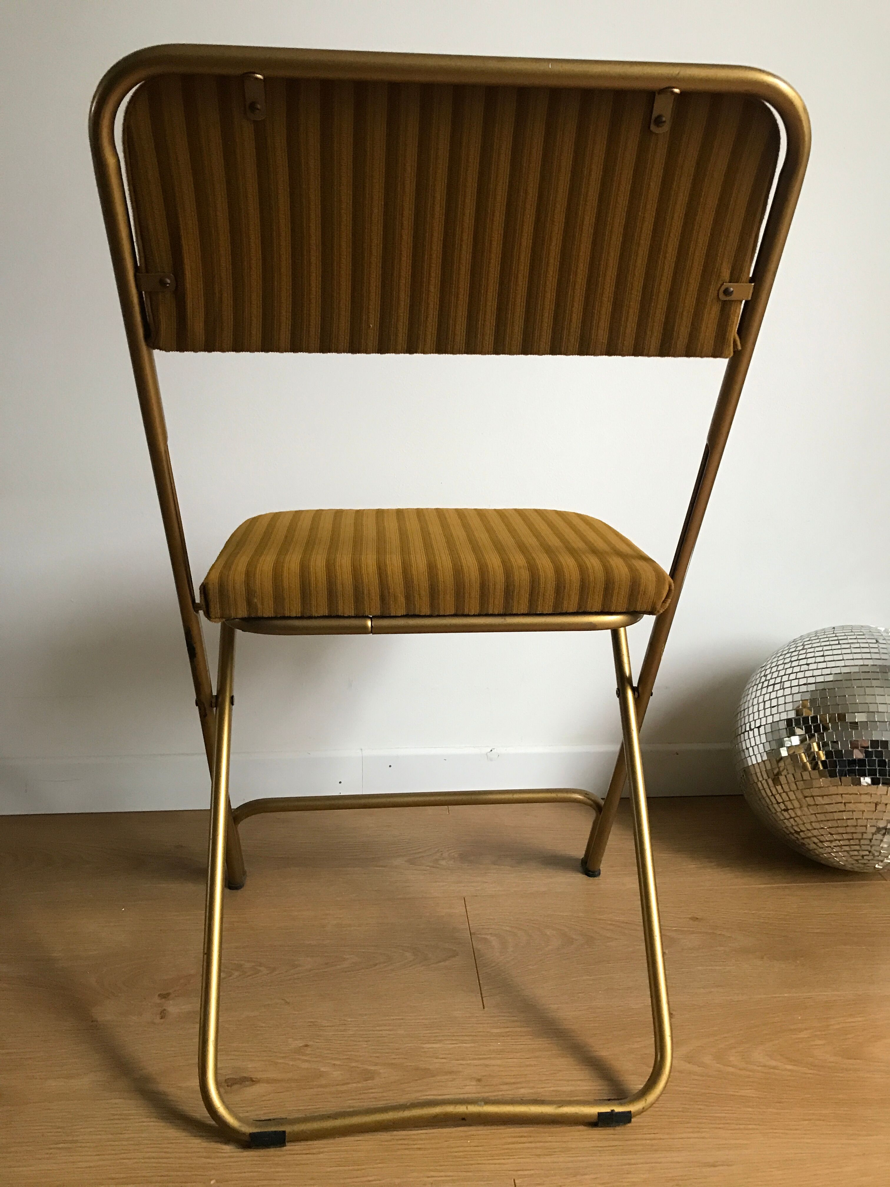 Vintage folding chair lafuma chantazur with striped gold fabric