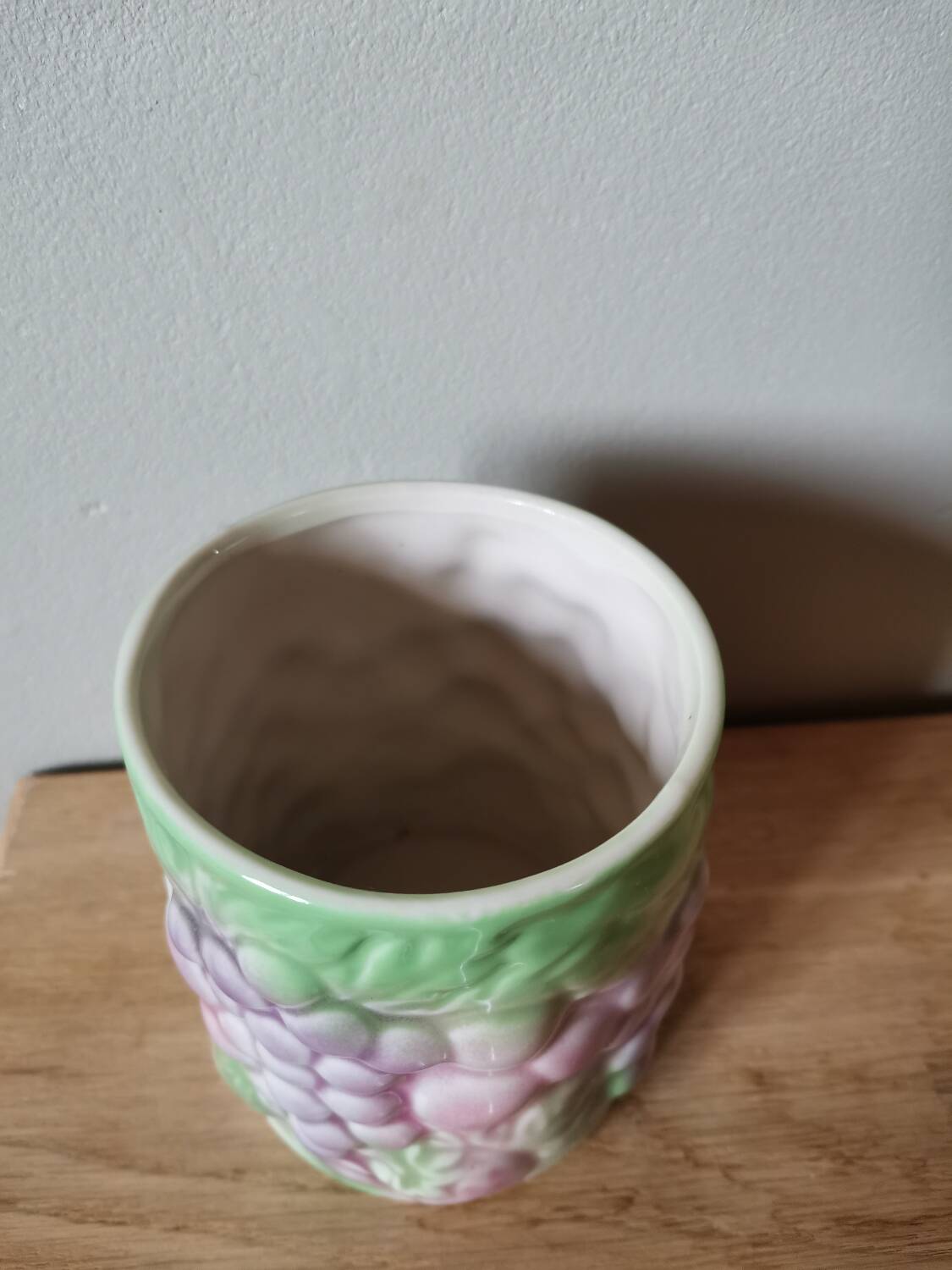 Vintage ceramic cup with vintage fruit pattern, pastel tone