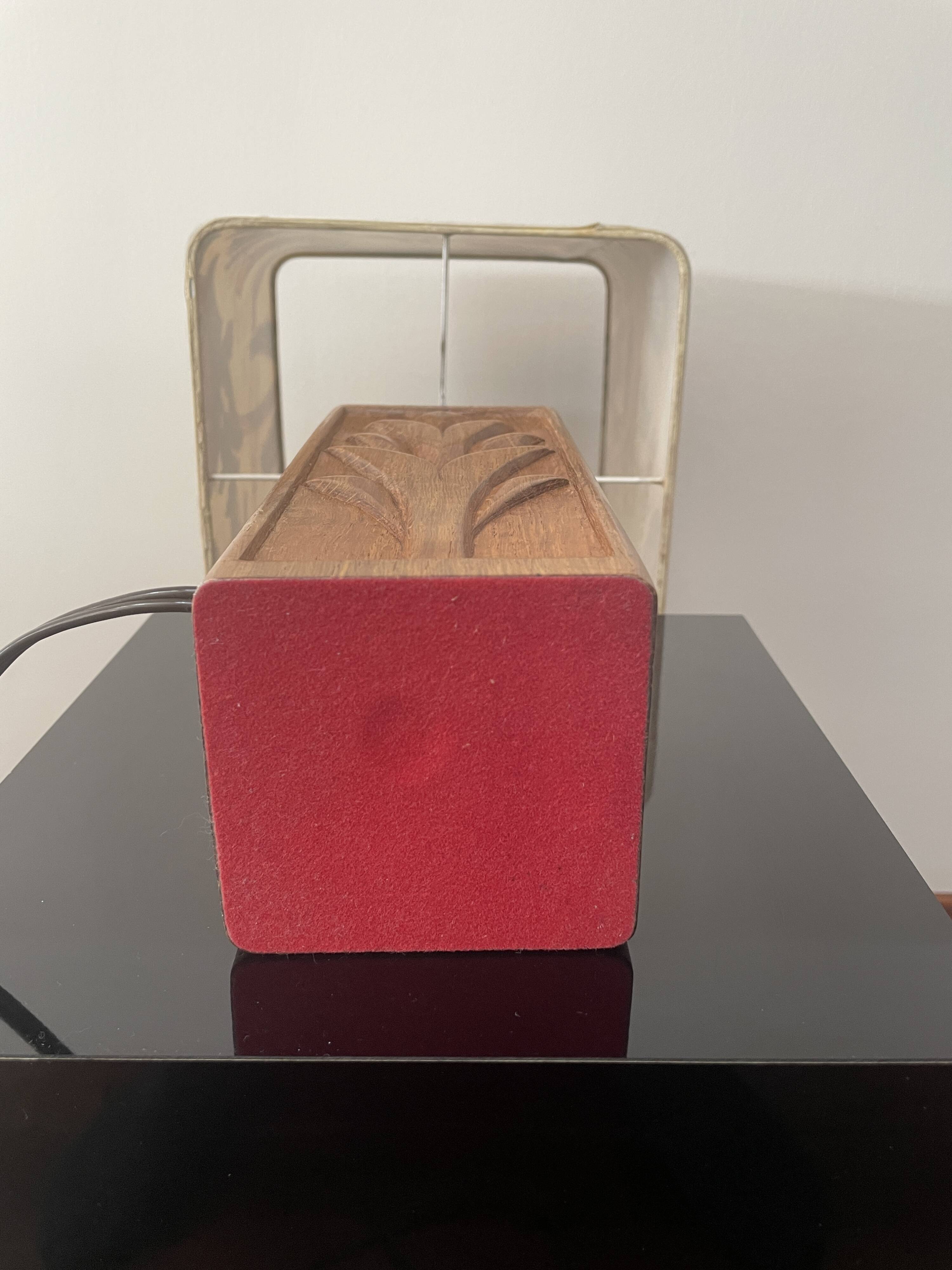 Wooden lamp with carved plant decoration from 1930-50, sold with a 1970 lampshade.