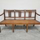 Directoire canapé in walnut with brass inlays, late 18th century.