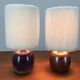 Pair of ceramic sandstone ball lamps and wool lampshades