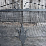 Old wrought iron chimney firewall