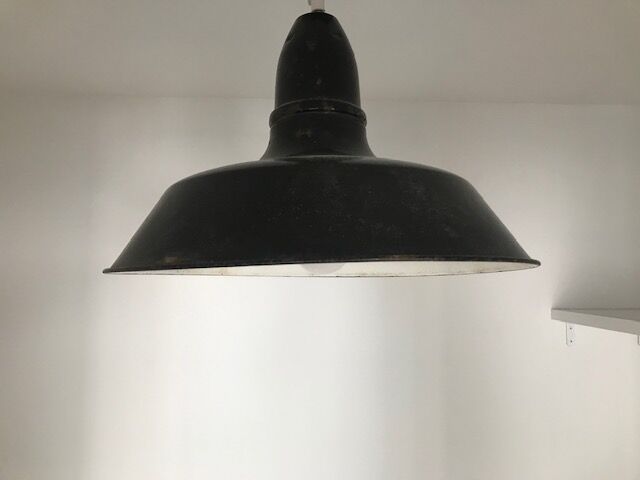 Old industrial suspension in enamelled sheet metal