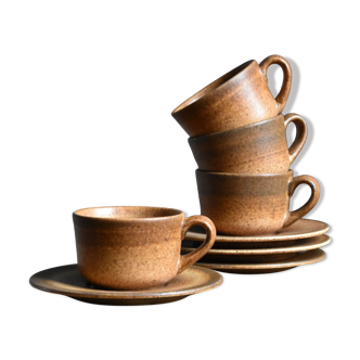 4 sandstone cups and saucers