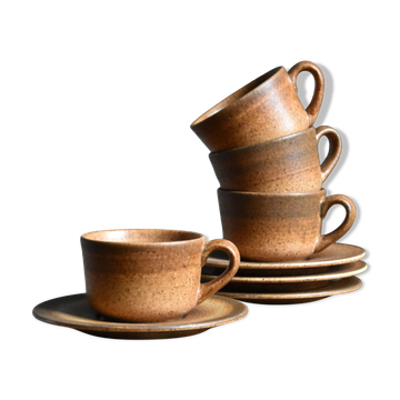 4 sandstone cups and saucers