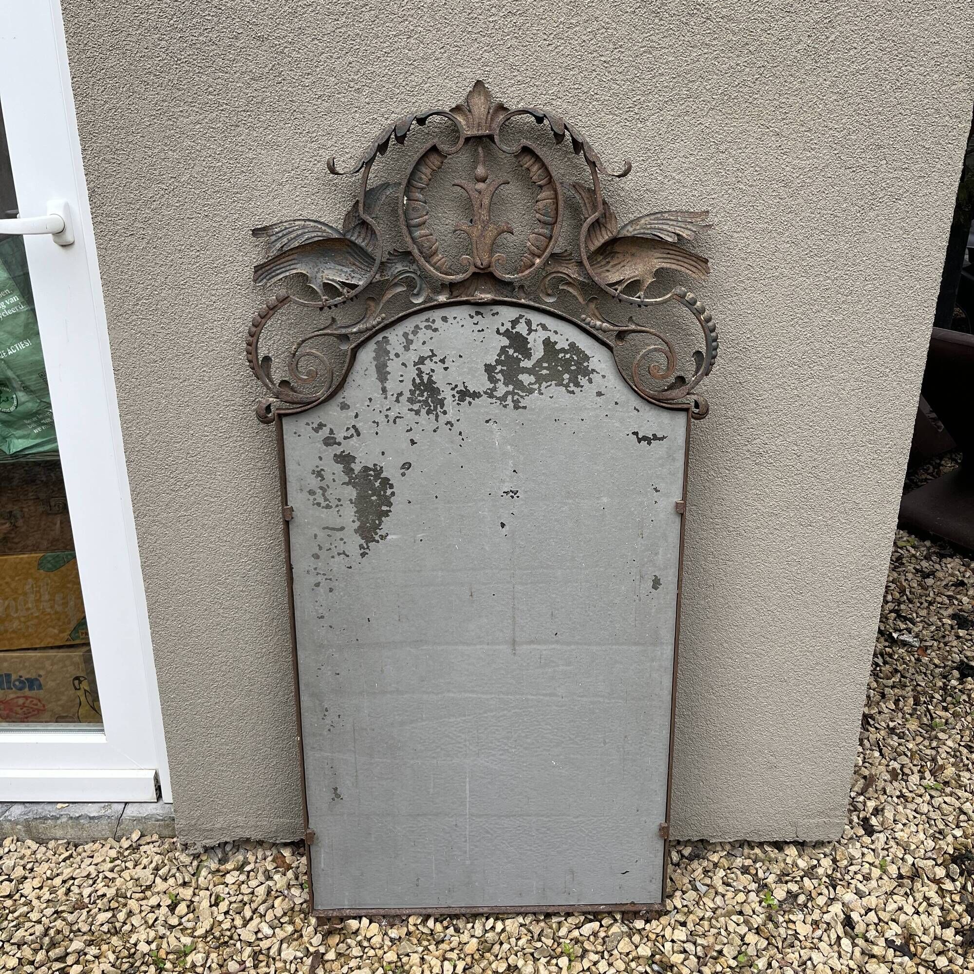 Art Deco wrought iron bird mirror in the style of Gilbert Poillerat, circa 1930