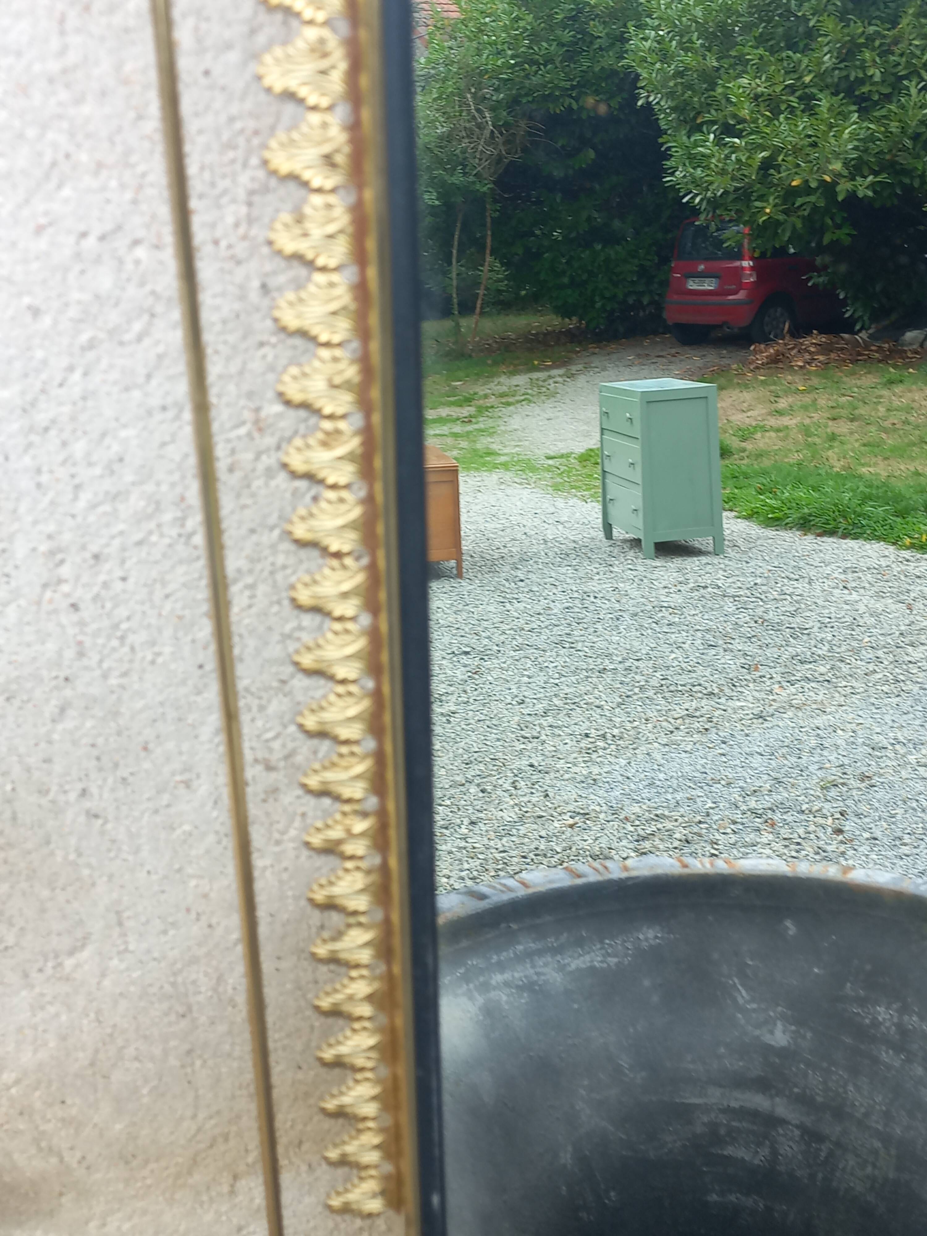 Vintage 1950s neoclassical style gold metal mirror