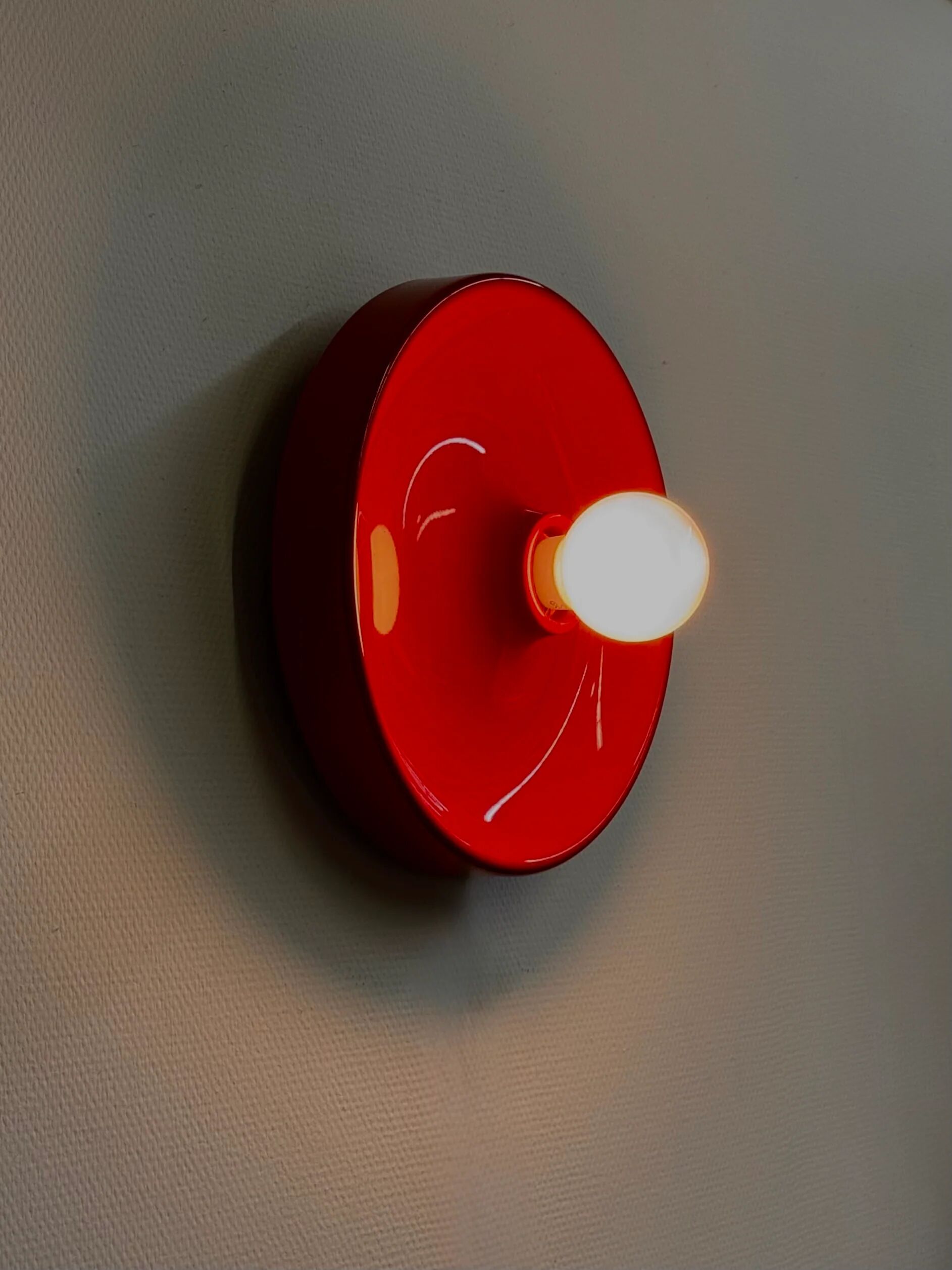 Red space age disc lamp by Enrico Tronconi