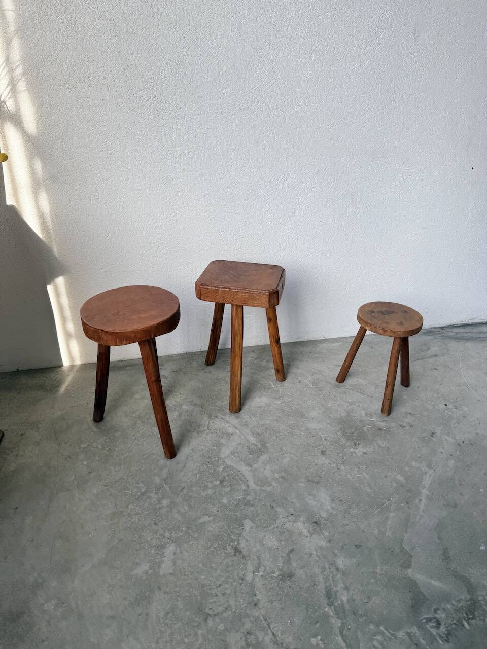 3 free-form oak tripod stools