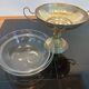 Art Deco brass cup and its engraved saucer.