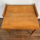 Modernist vintage chest of drawers in light chene has 3 drawers rattan top changing table
