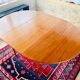 Expandable teak dining table, butterfly extension, circa 60s