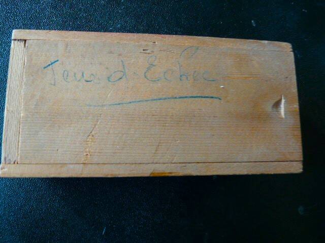 Onyx chessboard and complete wooden chess set.