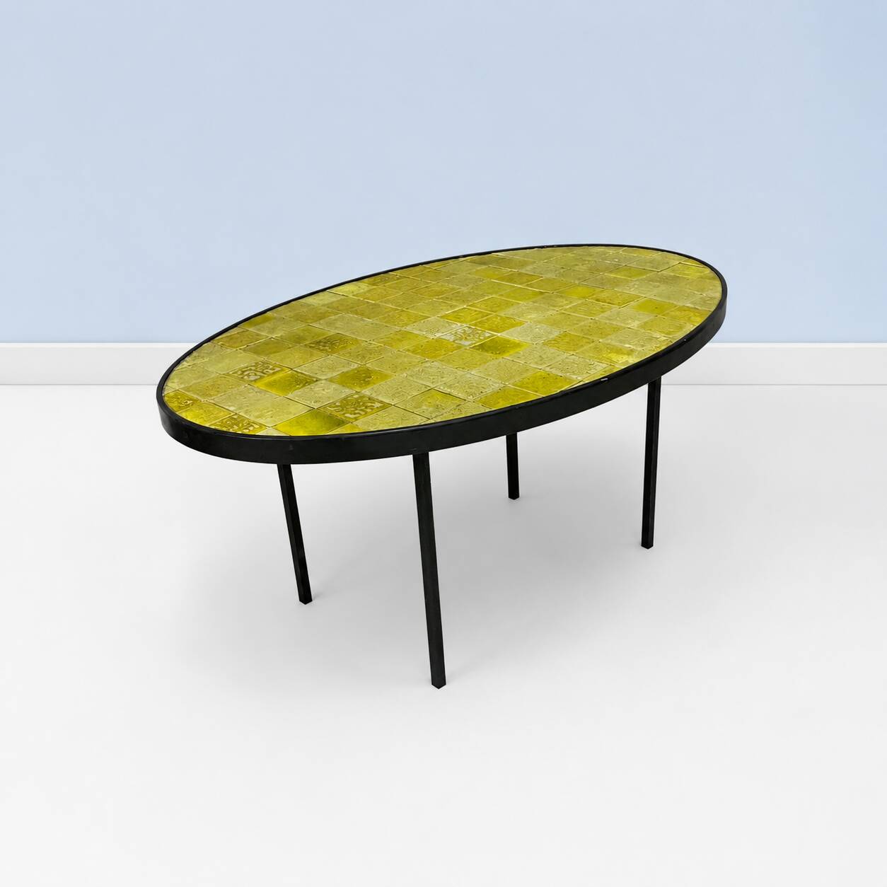 Oval coffee table in glazed ceramic and black metal, DLG by Mado Jolain.