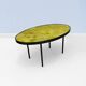 Oval coffee table in glazed ceramic and black metal, DLG by Mado Jolain.