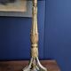 Pair of gilded wooden candlesticks. 19th century.